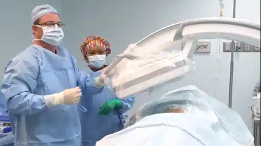 Doctors performing Kyphoplasty for a compression fracture
