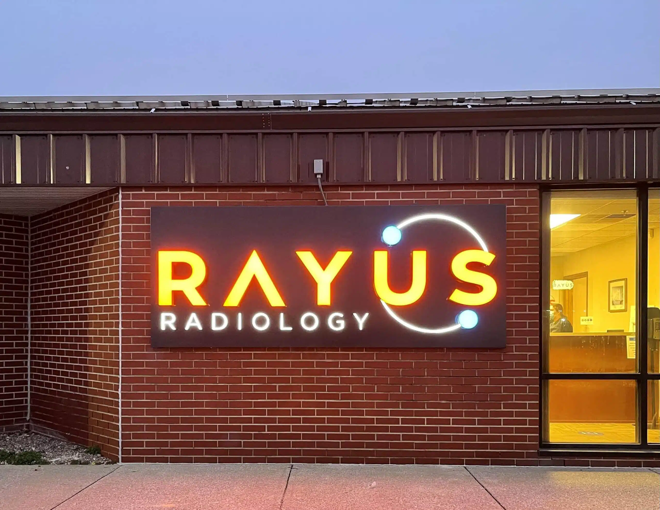 RAYUS Radiology diagnostic imaging center in 3802 Industrial Blvd., Suite 4, Bloomington, IN 47403 brick building