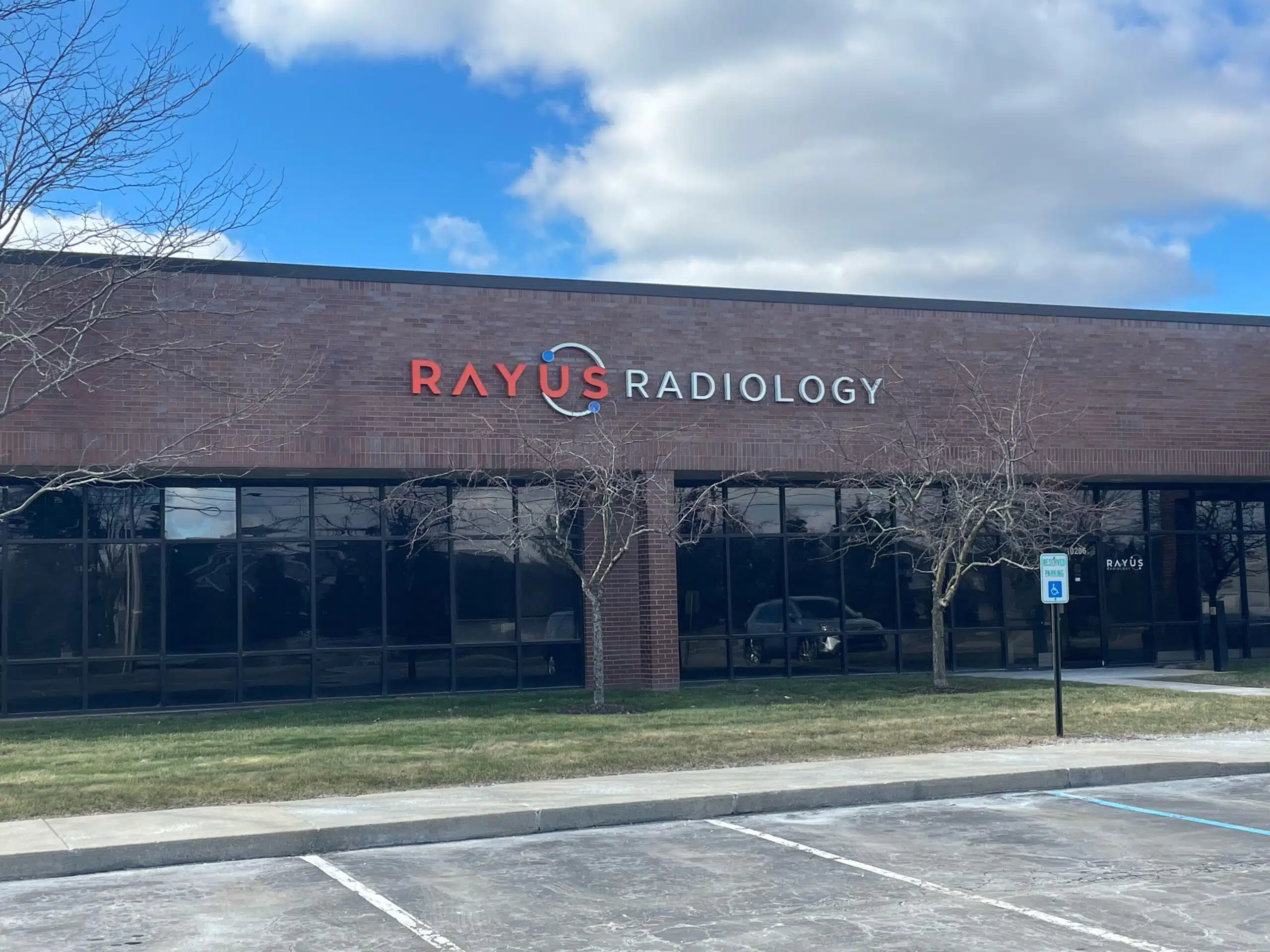 RAYUS Radiology diagnostic imaging center in 10206 Lantern Rd., Fishers, IN 46037 brick building large windows