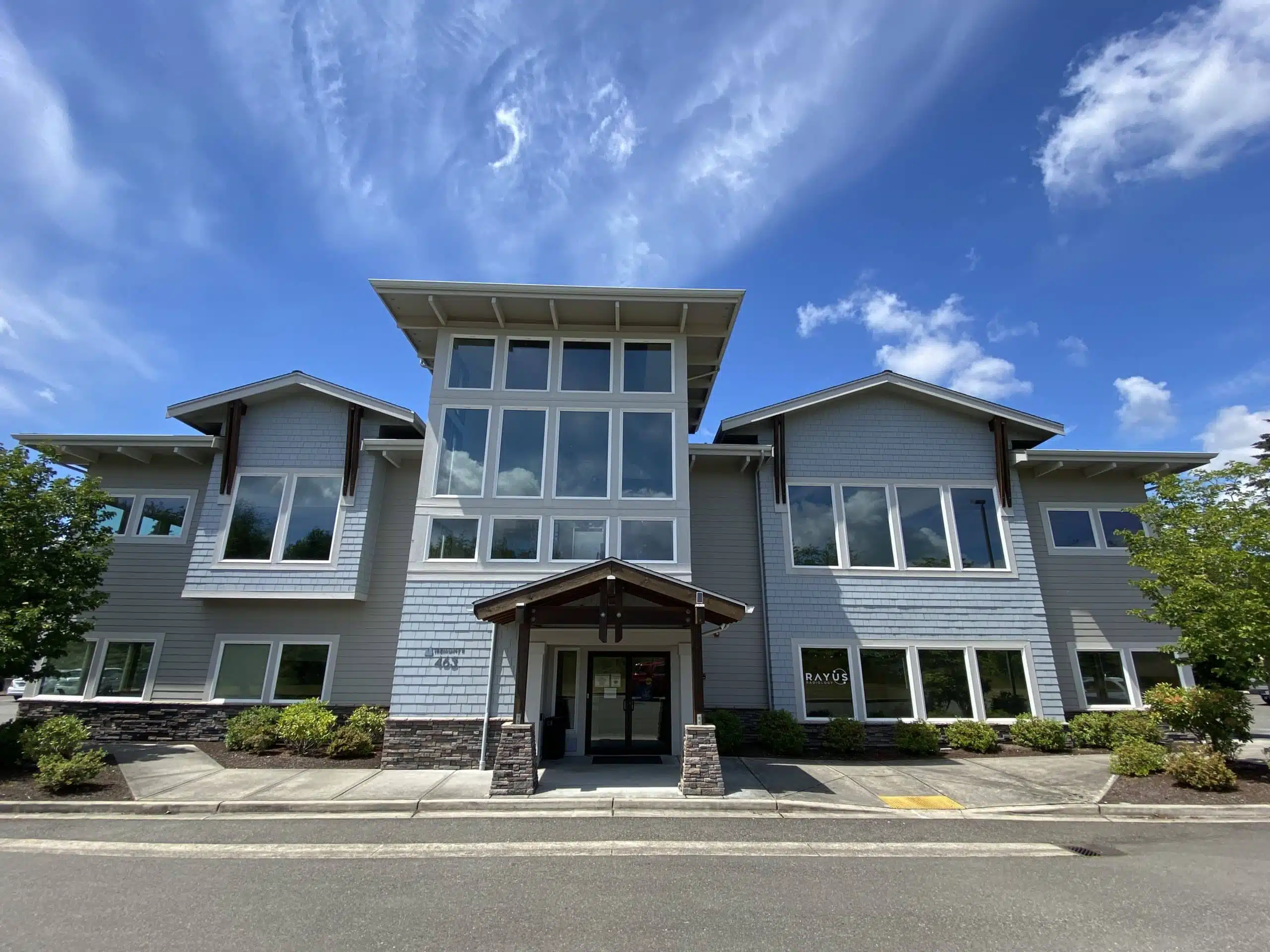 RAYUS Radiology diagnostic imaging center in 463 Tremont St. W Suite 130, Port Orchard, WA 98366 blue building