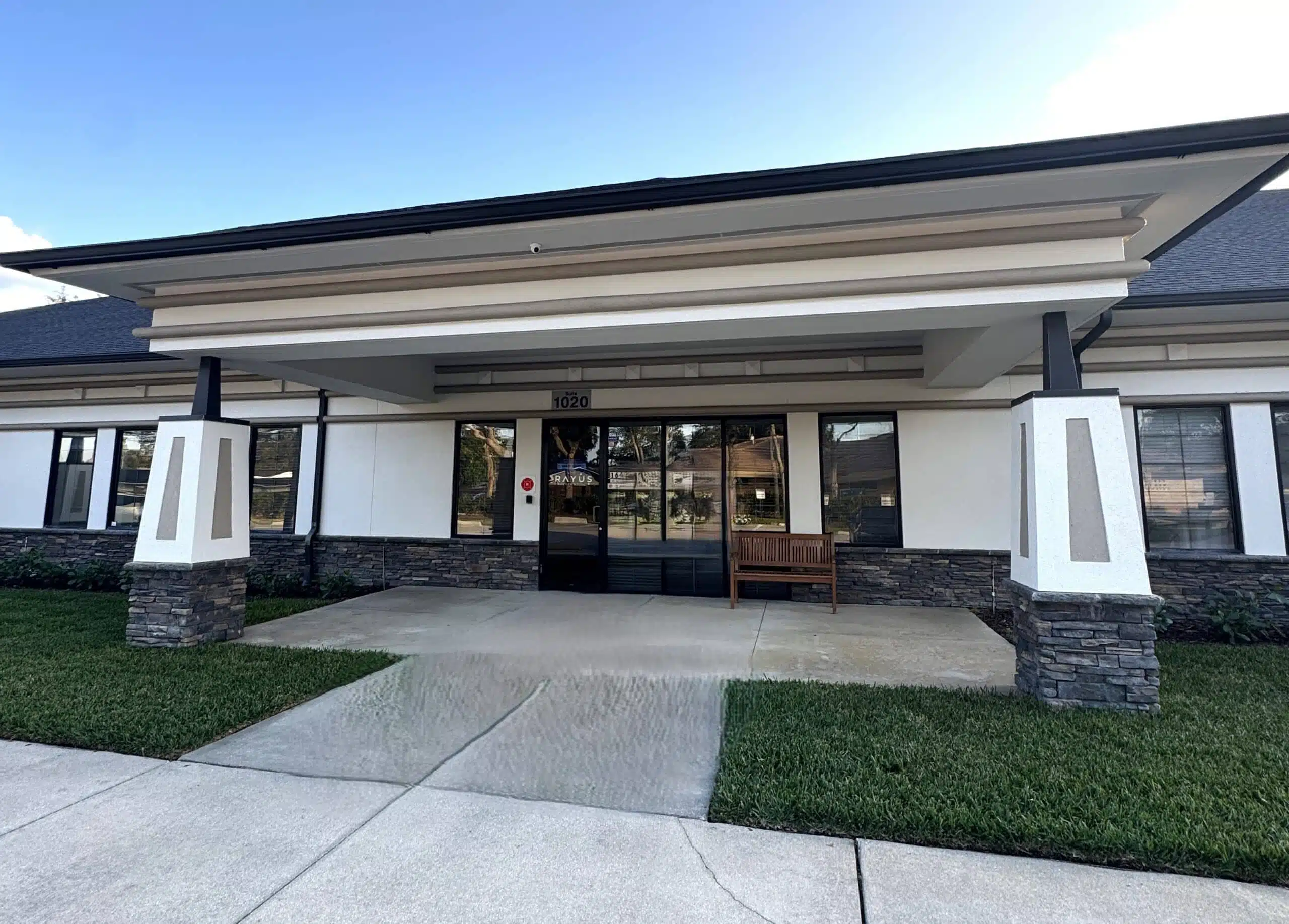 RAYUS Radiology Maitland Florida main entrance white and grey building