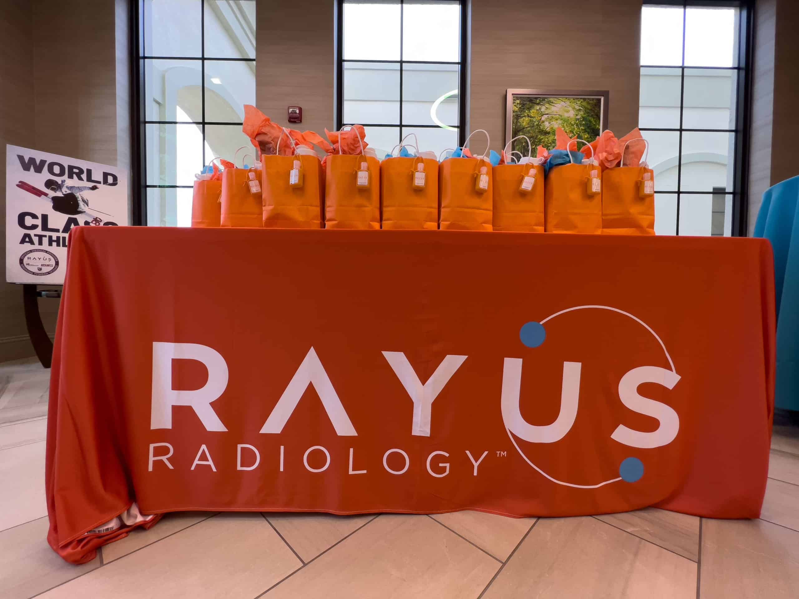 rayus radiology women's care wellington florida exterior grand opening gift bags on table