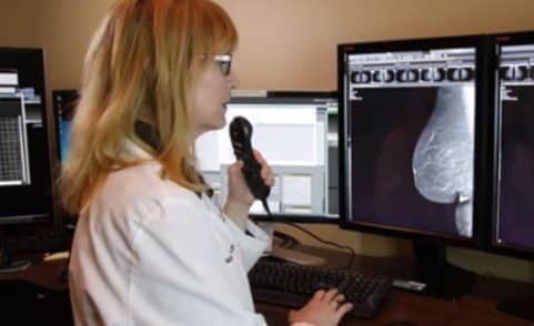 breast radiologist looking at a mammogram