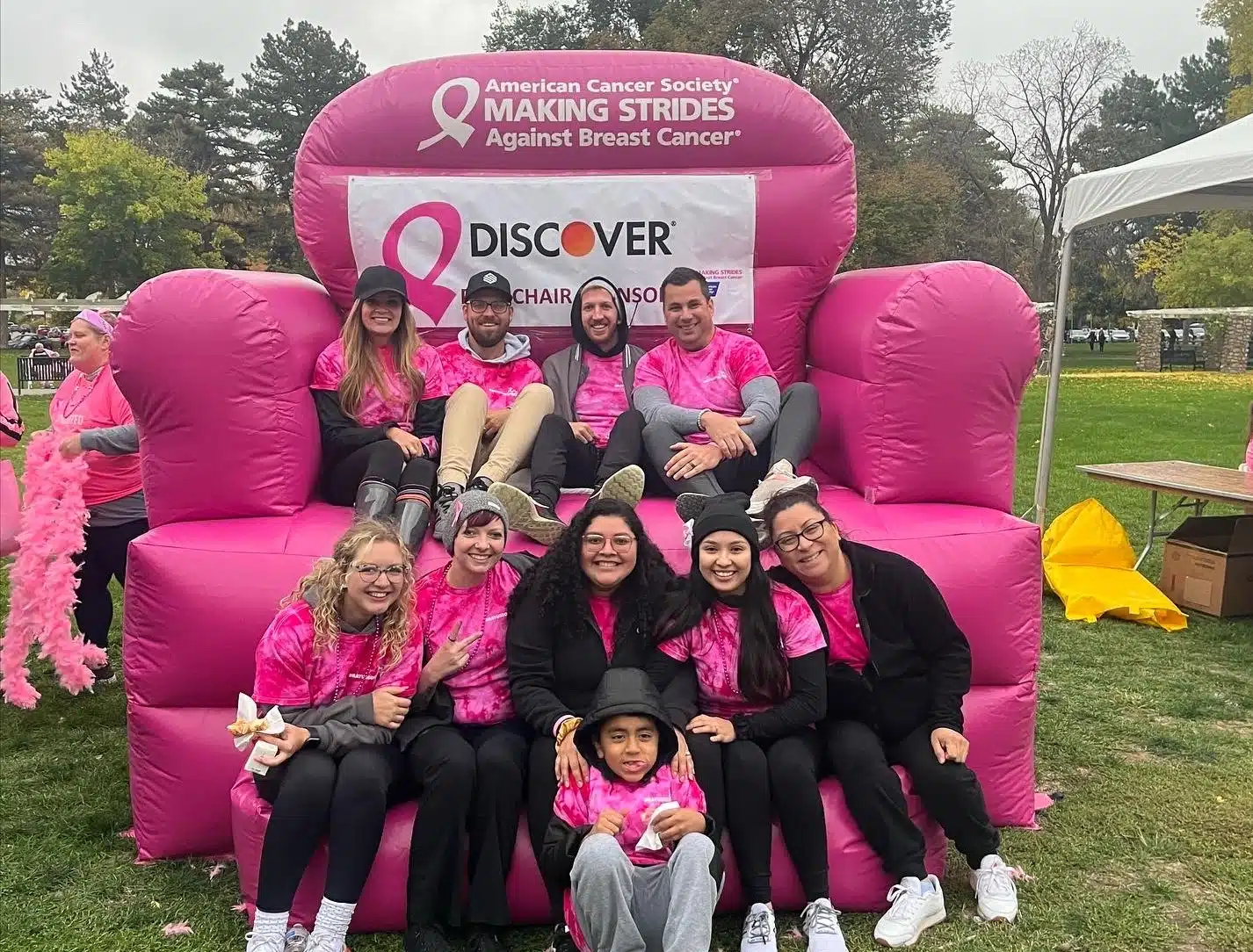 team members wearing pink at a breast cancer walk in utah