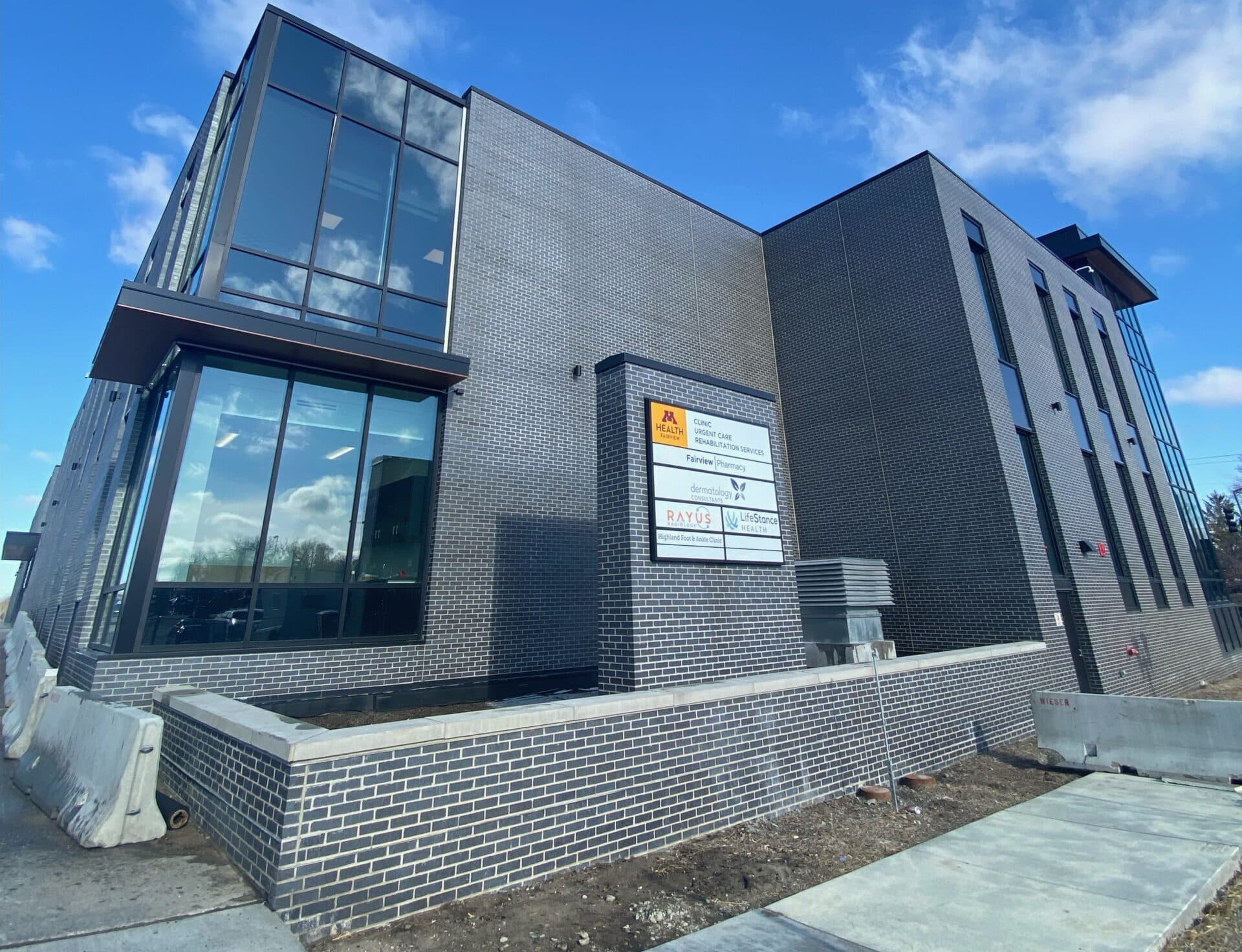 RAYUS Radiology diagnostic imaging center in 2270 Ford Pkwy Suite 202, St. Paul, MN 55116 grey brick building