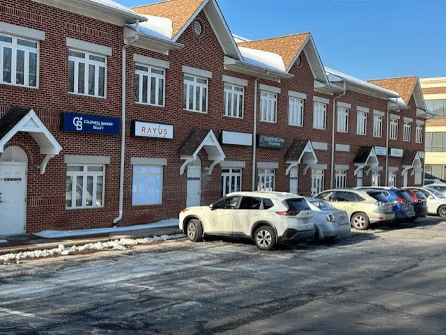 RAYUS Radiology Woodbridge CT brown brick building exterior next to other businesses